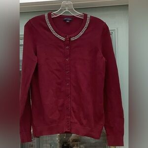 Tommy Hilfiger maroon cardigan with embellishments around the neckline.
